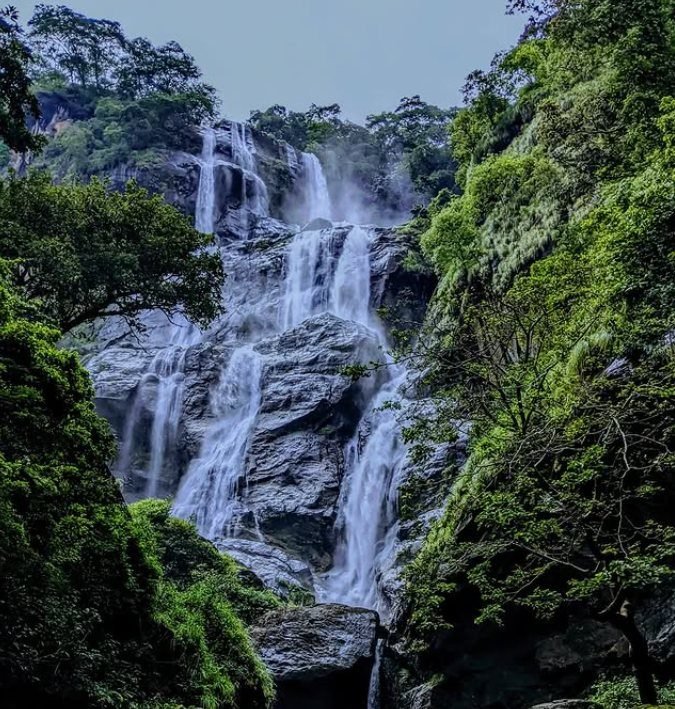 Waterfall cascading through the forested cliffs of Udzungwa Mountains National Park.